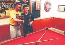 Pool players rack them up for hospice