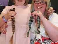 Mother and daughter Sam and Angel Stephens from Callington have hair cut off for Little Princess Trust