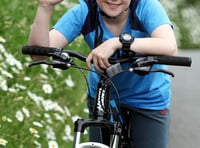 Exbourne youngster Joel Sawyer jumps on his bike for village defibrillator