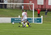 Lambs more than hold their own away to league leaders