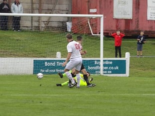 Lambs more than hold their own away to league leaders