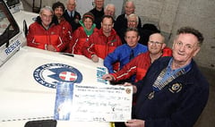 Okehampton Lions give thousands to North Dartmoor Search and Rescue Team