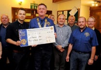 Okehampton Lions Club present cheque to Children's Hospice South West