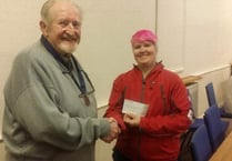 Outgoing Conservative Club president presents £200 to Okehampton's search and rescue team