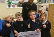 Tavistock Round Table donates £500 to Whitchurch Primary School for new books