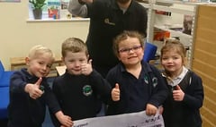 Tavistock Round Table donates £500 to Whitchurch Primary School for new books