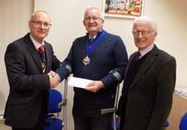 Yelverton Rotary Club make donation to Princetown's air ambulance landing site