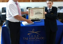 Fred secures his black belt