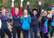 Tamar and Tavy dip oars in water at Winter League