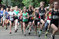 Great baton race at town carnival  - pass it on