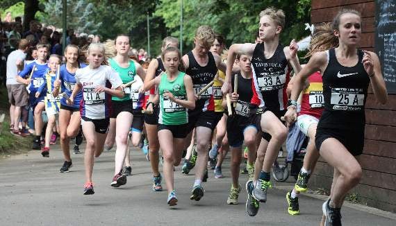 Great baton race at town carnival  - pass it on