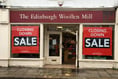 Closing down sale signs appear at  Edinburgh Woollen Mill store