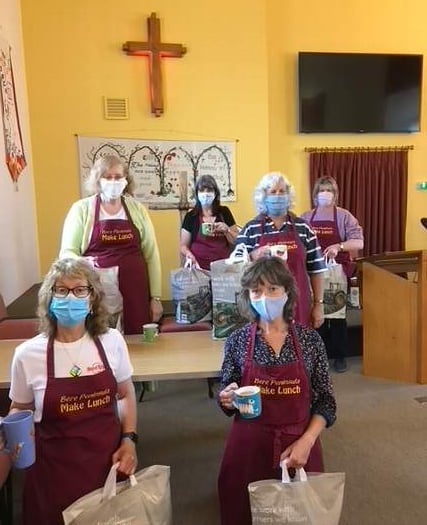 Team celebrates five months delivering family food parcels