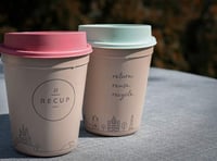 Buy someone a coffee and a cup and make them smile