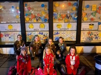 Brownies create window display for TASS