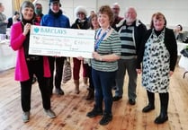 Dog walker makes it  to ‘John O’Groats’ and raises £420 for Gunnislake hall