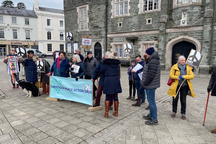 A group gathers for the vigil in Bedford Square