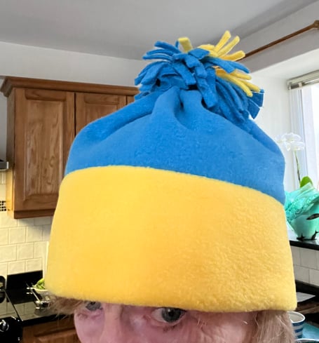 bobble hat being worn as part of Operation Bobble Hat to raise funds for Ukraine in Tavistock