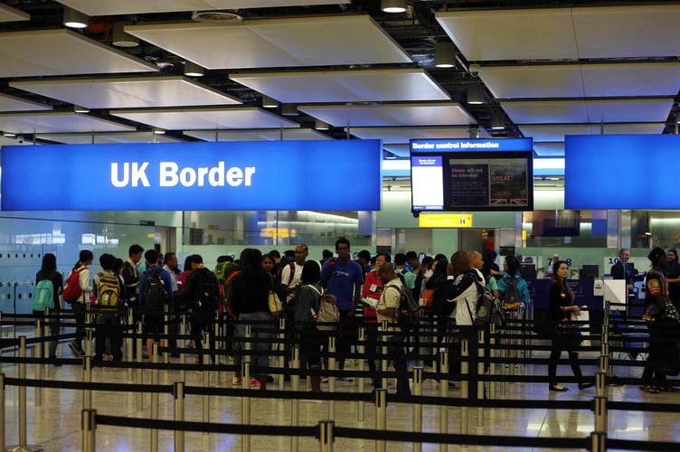General view of passengers going through UK Border at Terminal 2 of Heathrow Airport.