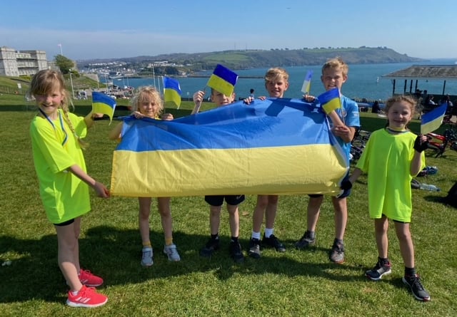 Youngsters at the finishing line at Plymouth Hoe  