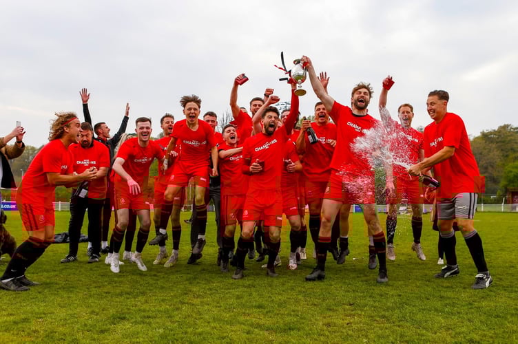 Captains Ben Cross and Lewis Daw lift the Western League Premier Division title