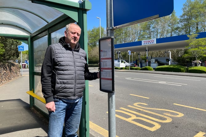 Cllr Andrew Long at Tesco bus stop is pleading for the end of second class treatment for South East Cornwall