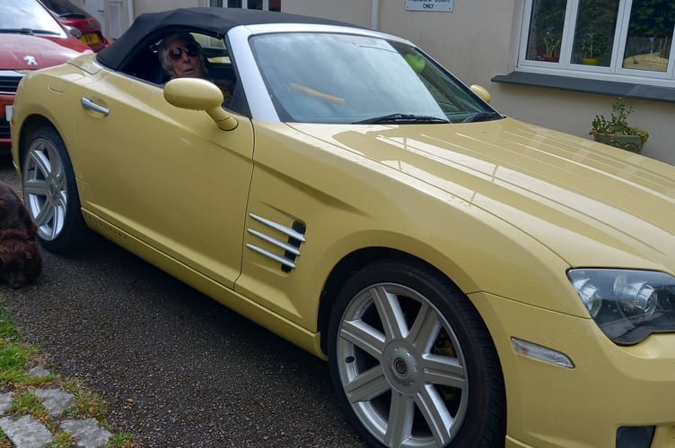 Peter Waymouth of Mary Tavy in his sports car