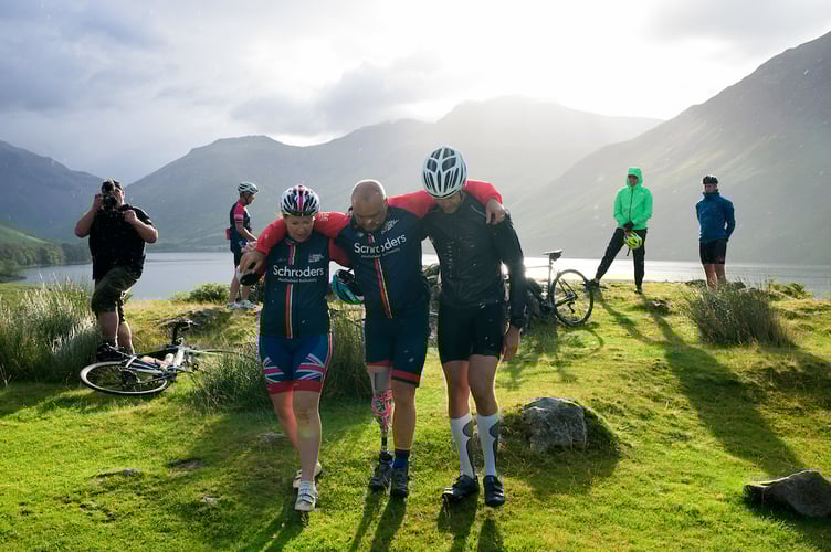 20220728 Copyright image 2022©
Sally Orange, physiotherapist and Ben Harrop assist Lee Spencer after he is forced to stop after the wounds on his stump become too deep to enable him to push the pedals after a successful summit of Scafell Pike, Englandâs highest mountain the day before, on his Landâs End to John OâGroats part of his Triathlon of Great Britain today, 28th July 2022. He will be climbing the UKâs three highest peaks - Snowdon, Scafell Pike and Ben Nevis during the ride. Descending from Ben Nevis, Lee will then complete 26 miles before finishing at Spean Bridge. This will be completed within a 14 day period.
Lee Spencer BEM, a veteran amputee who believes that no-one should be defined by their disability, is about to take on another âfirst of a kindâ challenge - the Triathlon of Great Britain.
To support Lee, please donate at his just giving page - https://www.justgiving.com/fundraising/thetriathlonofgb
Further information is available from Laura Milward on 00350 54003968 / laura@greenroomadvisory.comâ¨Lee is available for interviews (DTBC)
For photographic enquiries please call Anthony Upton 07973 830 517 or email info@anthonyupton.com
This image is copyright Anthony Upton 2022©.
This image has been supplied by Anthony Upton and must be credited Anthony Upton. The author is asserting his full Moral rights in relation to the publication of this image. All rights reserved. Rights for onward transmission of any image or file is not granted or implied. Changing or deleting Copyright information is illegal as specified in the Copyright, Design and Patents Act 1988. If you are in any way unsure of your right to publish this image please contact +447973 830 517 or email: info@anthonyupton.com20220728 Copyright image 2022©
Apogeeâs support walkers pose during Lee Spencer at the summit of Snowdon ascending, via the Pyg Track and the descent via the Miners Tracker during the Landâs End to John OâGroats part of his Triathlon of