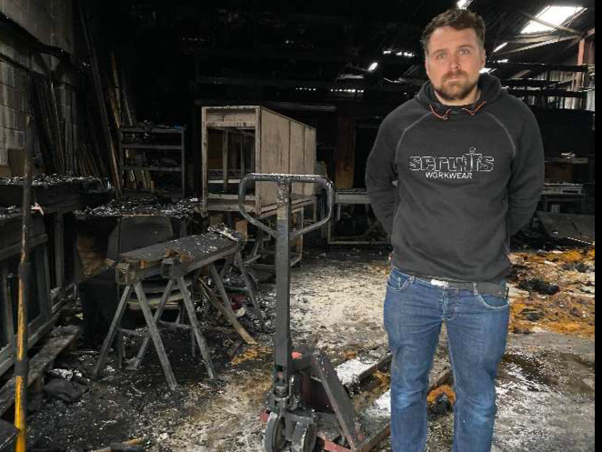 owner Harry Glover in fire-devastated workshop of The Pet Carpenter, Yelverton, October 2021