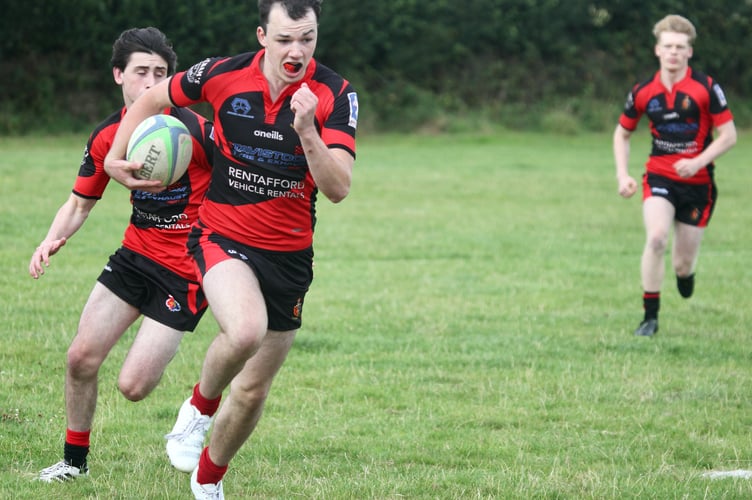 Liam Watts flying down the wing