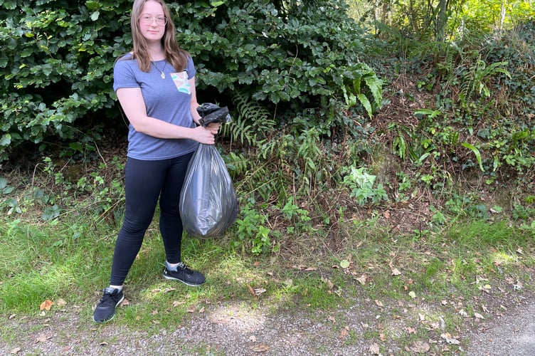 Emma Rogers litterpicking on Calstock Road 