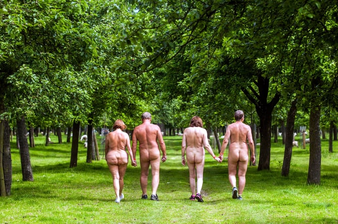 File photo of some naked walkers on Dartmoor.

 See SWNS story SWLNramble. A group of all-male naked ramblers spotted on a moor has sparked an online debate about whether it should be made illegal - and constitute sexual harassment. Six undressed men wearing only socks, boots and rucksacks, have been seen walking on Dartmoor in Devon. Following the sighting last month, one member of the public posted details prompting a discussion on whether naked rambling in popular public areas should be allowed. The Dartmoor National Park Authority confirmed naturism was not covered by its byelaws and said police could get involved if people were offended.  