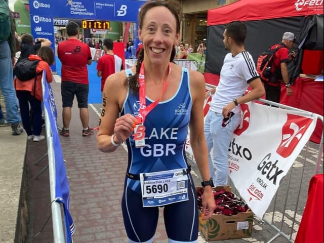 Athlete Sam Lake with her European aquathlon age group winning medal.