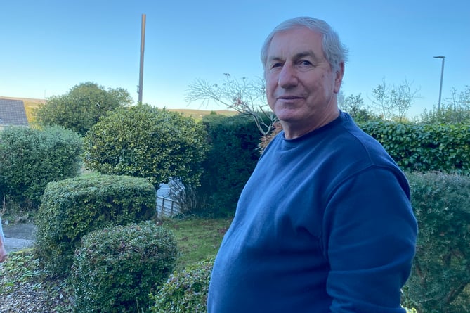 Resident John Fairbrass who says the Horrbridge telecoms mast - planned to be double the height - is already a blot on his view.