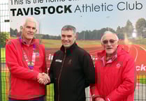 Athletic club hands over £1,000 to Lions