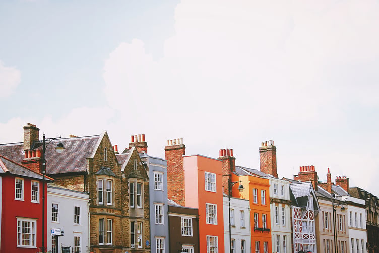 A row of colourful houses in a UK street