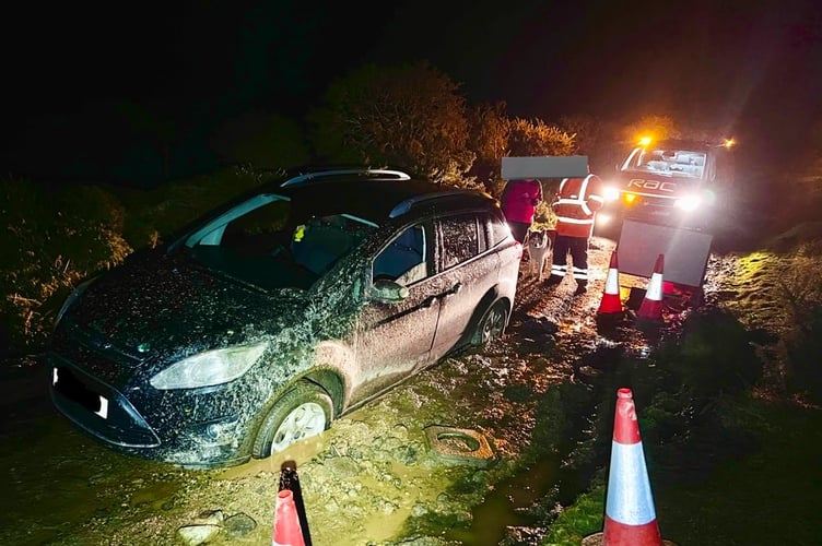 Car stuck in the mud at Bellever