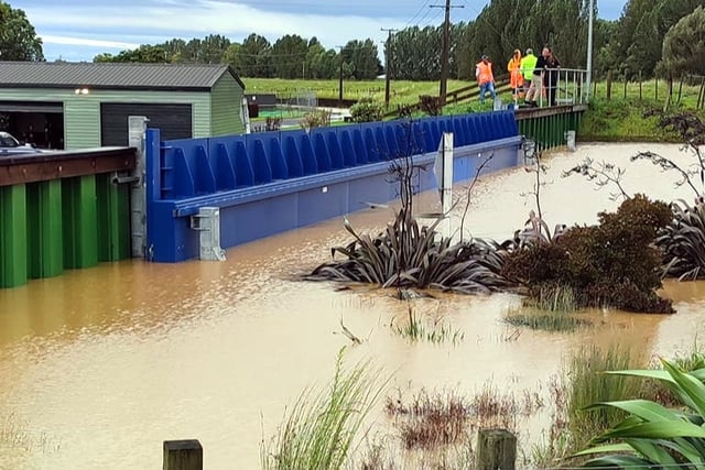 Town barriers stop flooding overseas