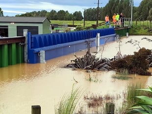 Town barriers stop flooding overseas