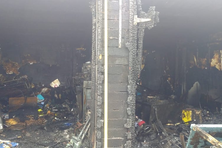 The wreckage inside the property once the fire was out