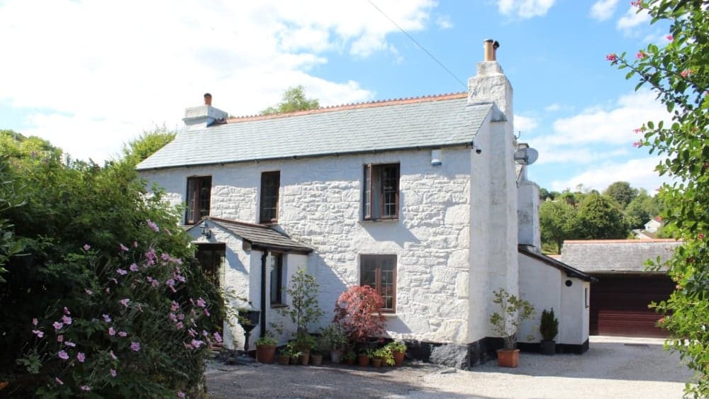 Gunnislake storybook cottage for sale has its own pizzeria terrace with