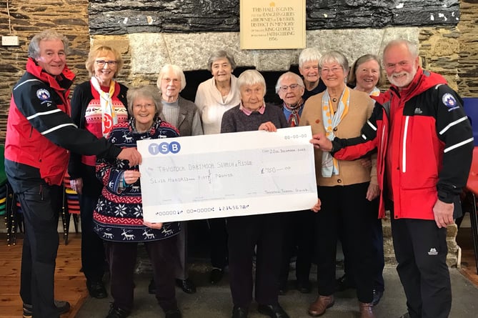 Tavistock Trefoil Guild present cheque to Dartmoor Search and Rescue