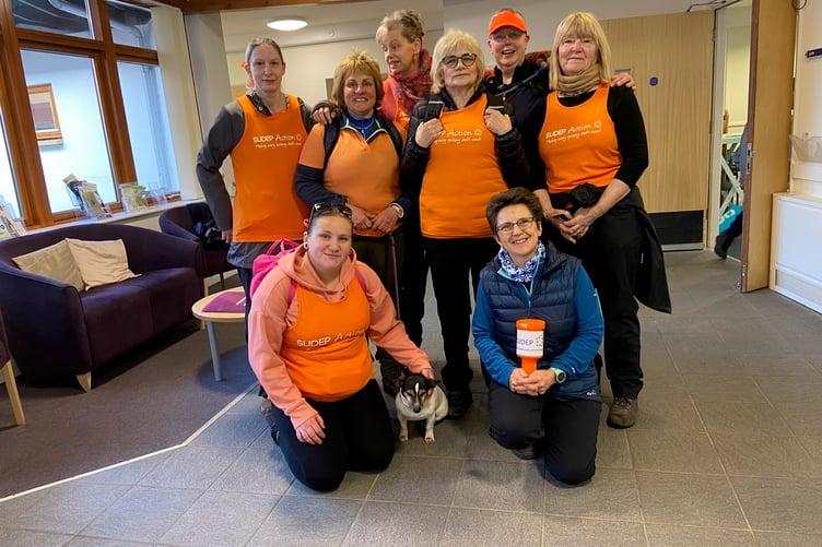 Left to right bottom row: Lauren Hargreave, Lottie the dog, Anna Dodd. Left to right top row: Janice Lee, Penny Rowe, Sarah Packer, Elizabeth Tunmore, Janet Piper and Pam Thurgood