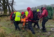 Dartmoor walker rescued in stormy weather by search and rescue team