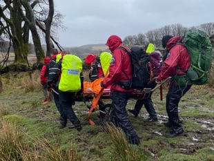 Dartmoor walker rescued in stormy weather by search and rescue team