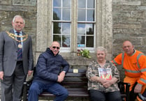 Widow unveils bench in tribute to her husband