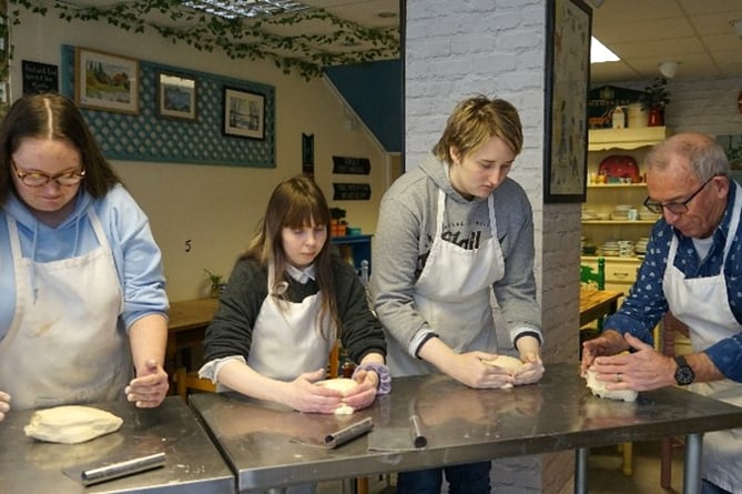 Three EE participants and their mentor Bob making bread in North Devon.