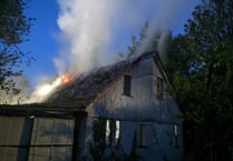 Firefighters tackle garage fire