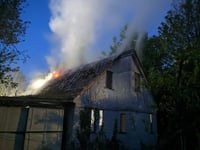 Firefighters tackle garage fire