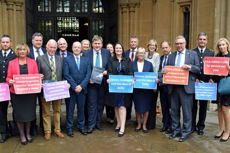 Police and Crime Commissioner Alison HernandezÕs Devon and Cornwall delegation present Policing Minister Kit Malthouse with a dossier of evidence about the pressures placed on the force by the holiday season.
Picture: LDR service